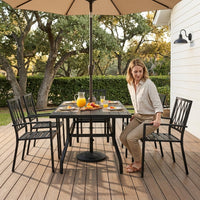 7-Piece Black Iron Outdoor Dining Set — Lifestyle